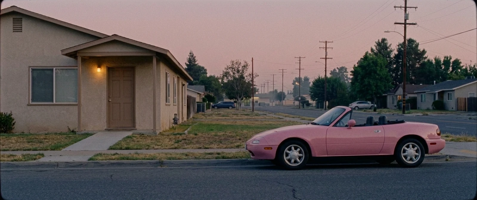 EXTERIOR / Home and pink convertible